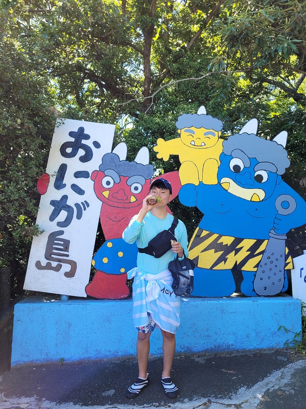## 1st Day: Swimming on Megijima Island
During the day, we ferried to Megijima Island. Here, we visited the **Onigashima Cave**, a welcome respite from what felt like the year’s hottest day, with temperatures soaring above 37°C. Later, we cooled off in the nearby sea, a swimming area complete with lifeguards. 