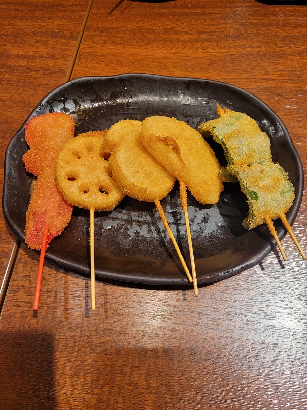 ## 1st Day: A Japanese Pub
After an exhausting day of swimming and hiking, we retreated to an **Izakaya**, a traditional Japanese pub, for dinner.