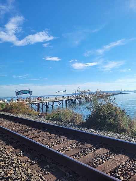 ## Borderline Beauty: Exploring White Rock
Near the border between Vancouver and Washington, there’s a little spot called the White Rock (in Korean.. 백석동??). There’s a train trail, which I’m not sure if it’s operating, and a nice bridge stretching out the sea. It’s a nice visit on a weekend when the weather allows. It feels more like a real Canada there: peaceful and quiet regional residence, park, low buildings, etc. 