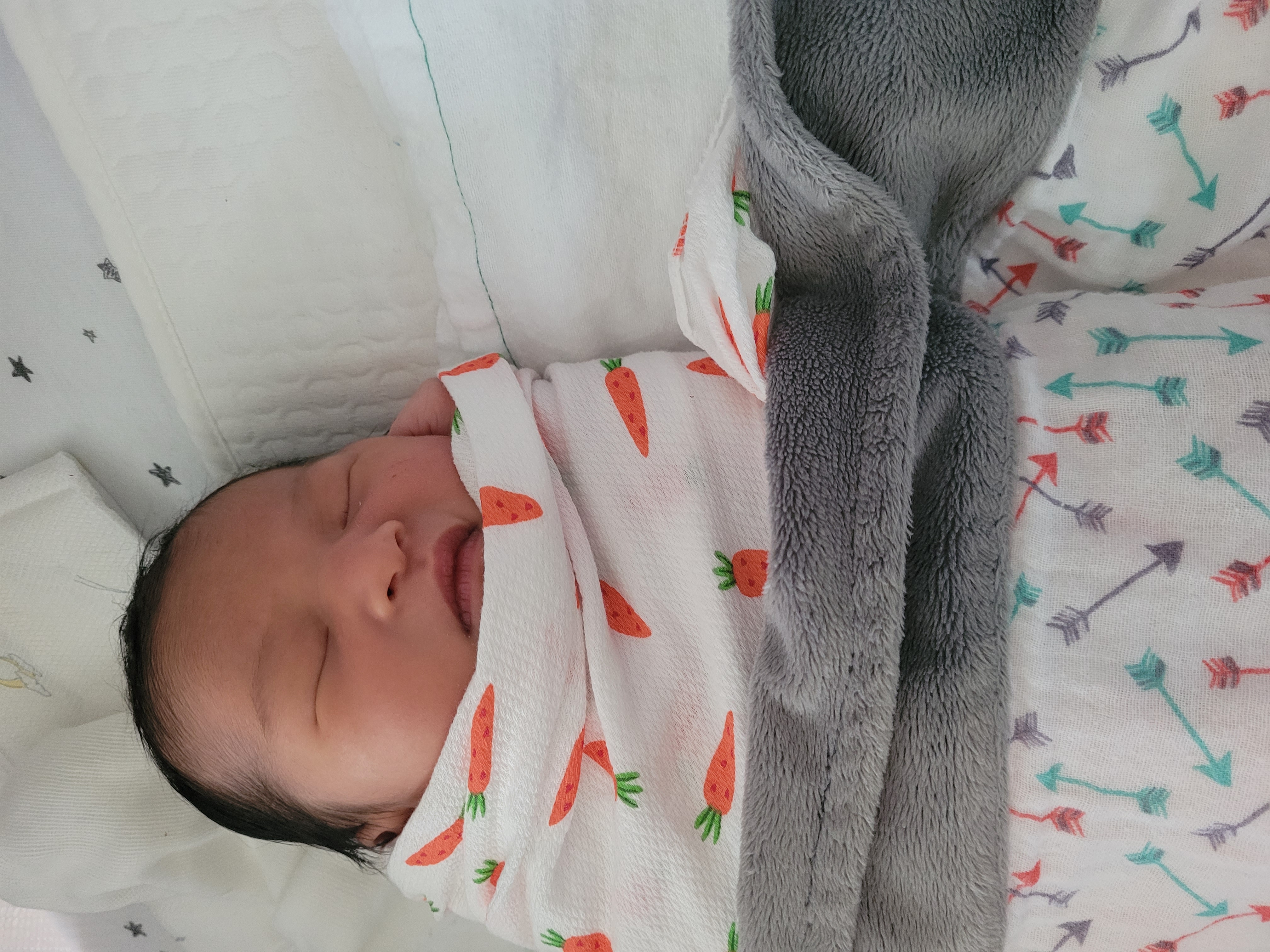 Babies grow so fast! My baby was so small and vulnerable like this just 2 months ago. She could not stretch her arms straight, probably because she was crouching for 10 months in the mother's womb. 